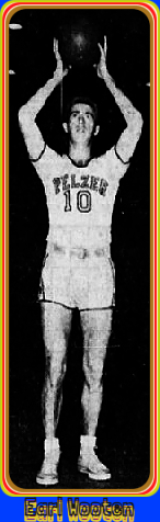 Picture of Earl Wooten, basketball player for the semi-pro Pelzer Bears, standing with ball held over his head with both hands, in his #10 PELZER uniform.